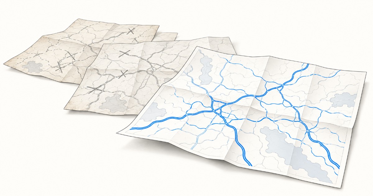 Několik map různého stáří, nejnovější mapa vpředu s jasně modrými čerstvými cestami, starší mapy mají přeškrtnuté úseky